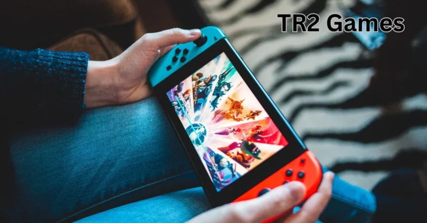 a person holding a video game device tr2 games
